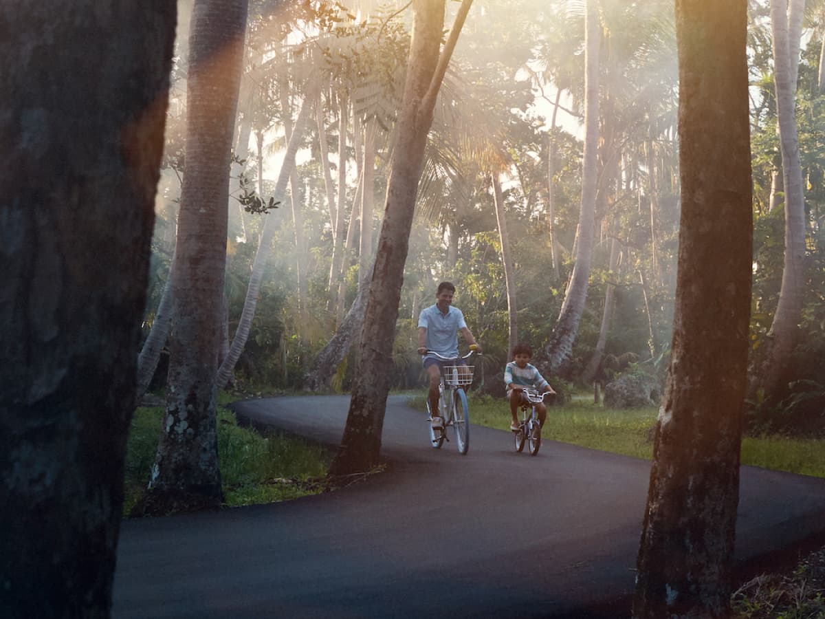 Family biking around private residence