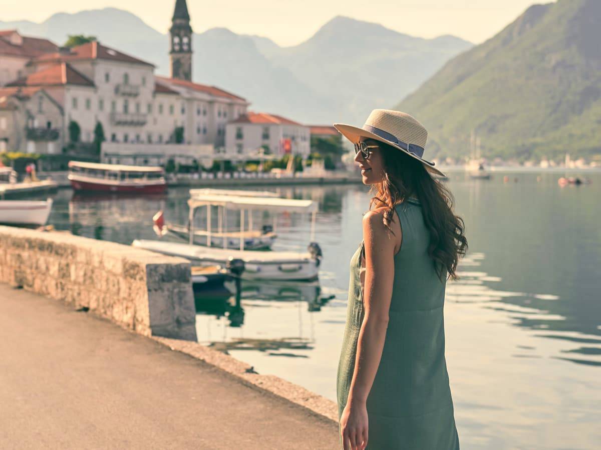 person standing by a lake